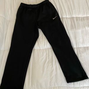 Nike track pants.